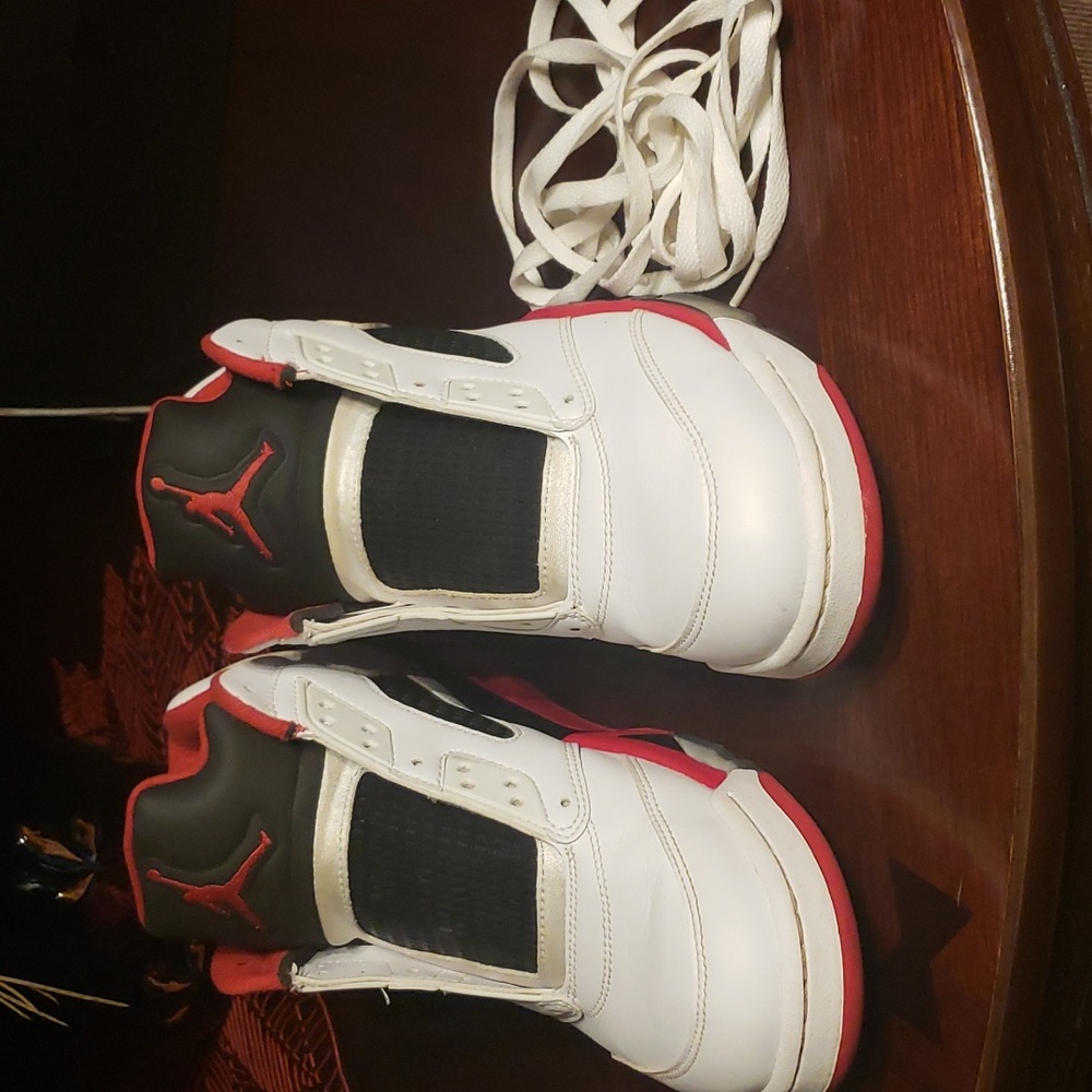 Black and red and white Nike Air Jordan